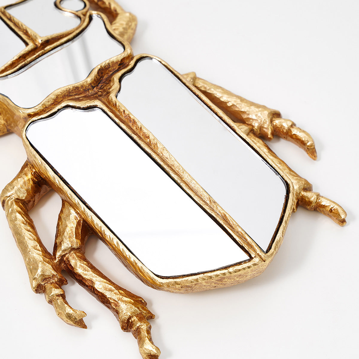 Golden mirror beetle wall decoration