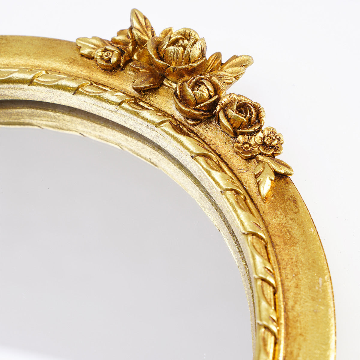 Golden carved wall mounted mirror